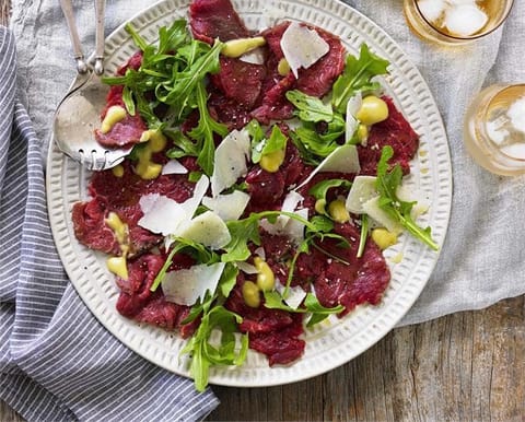 Beef carpaccio with rocket and shaved parmesan